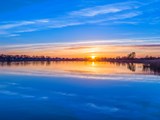 Sonnenuntergang in Zinnowitz mit Spiegelung im Wasser