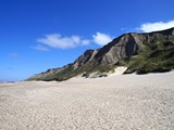 view along the beach in front of the cliffs at the well-known bovbjerg fyr lighthouse on the danish north sea coast, Denmark
