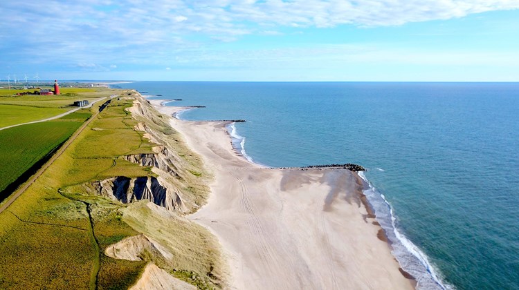 aerial view of Bovbjerg Fyr lighthouse, cliffs and North Sea in Denmark