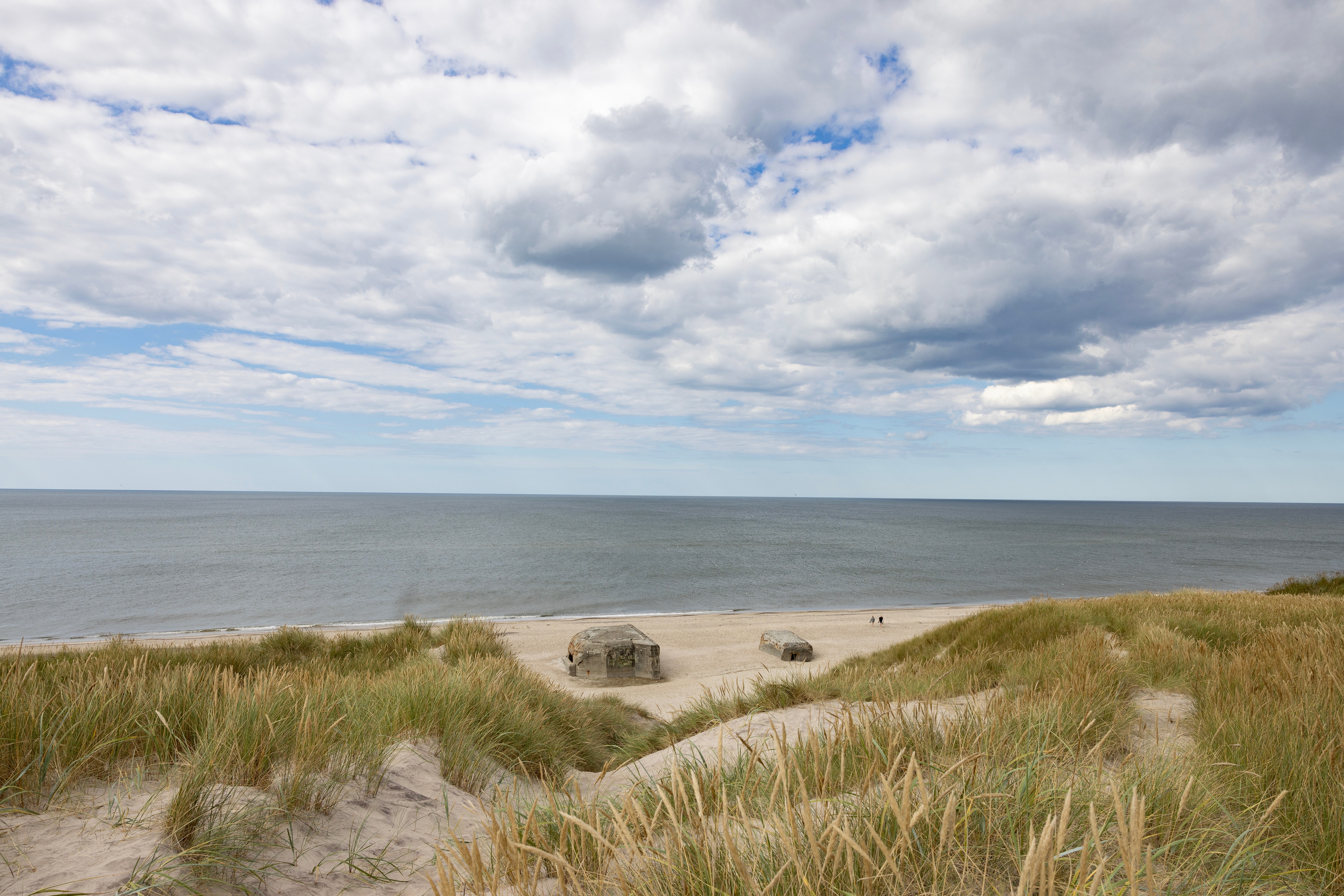 German bunkers from World War II on Sandy beach by Husby town