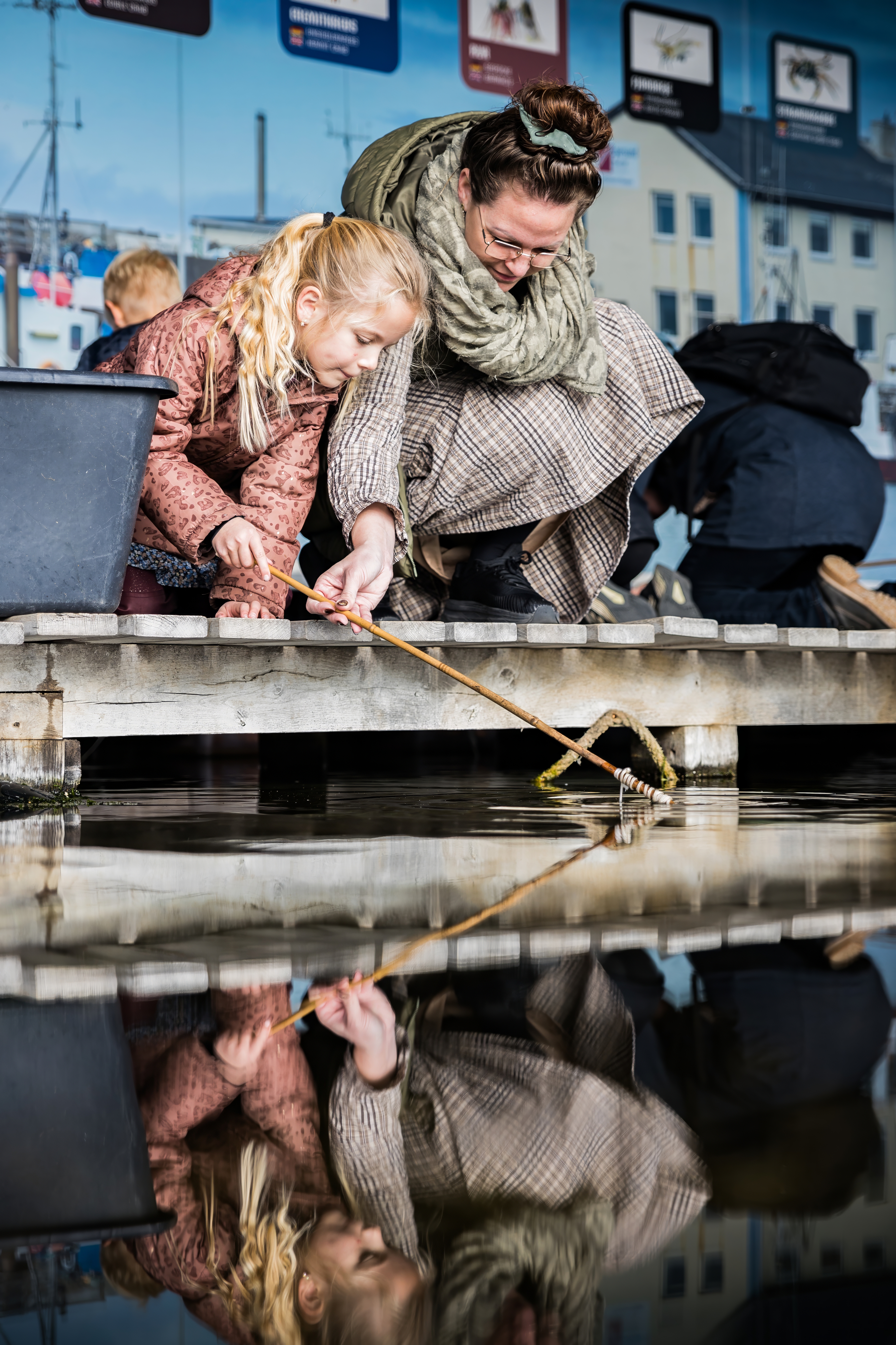 Krabbenfischen Mutter und Kind